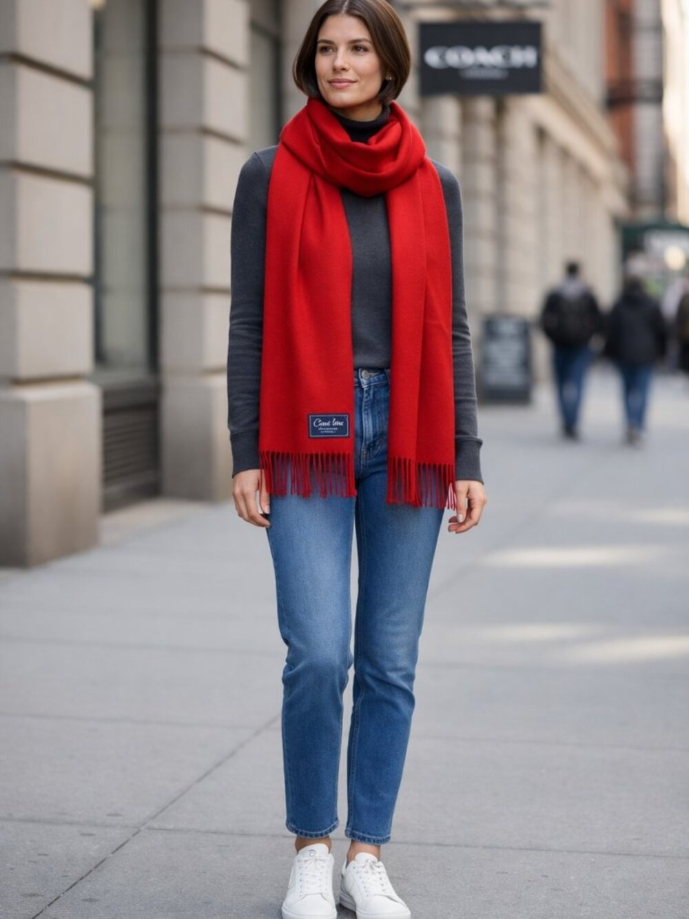 Timeless Coach wool scarf in a deep red shade with elegant fringe and the iconic